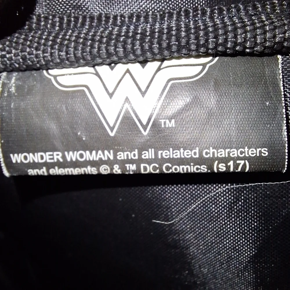 A Wonder Woman large backpack. EUC. All zippers and pockets work.
